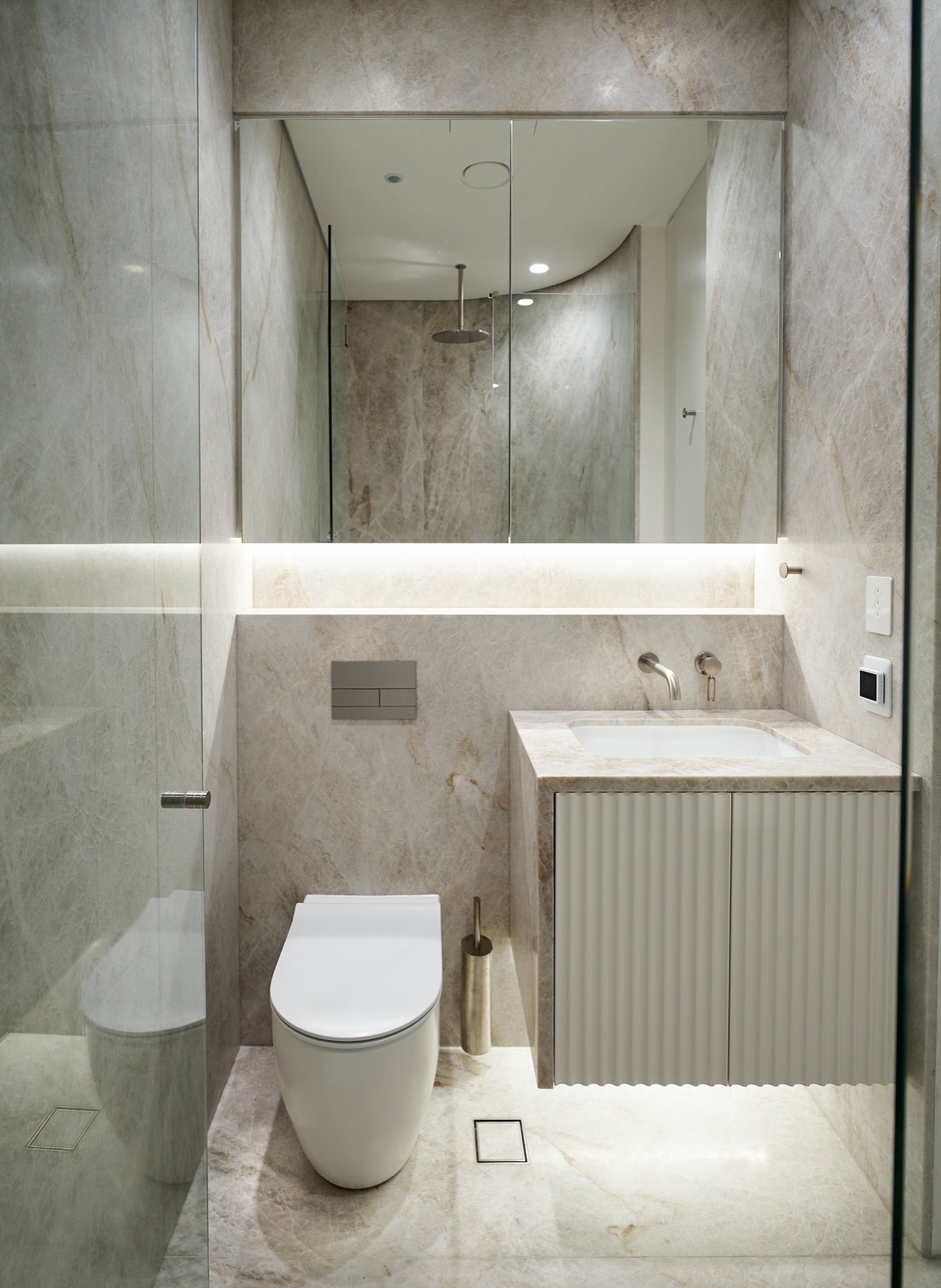 Full-stone ensuite by Perelli Group