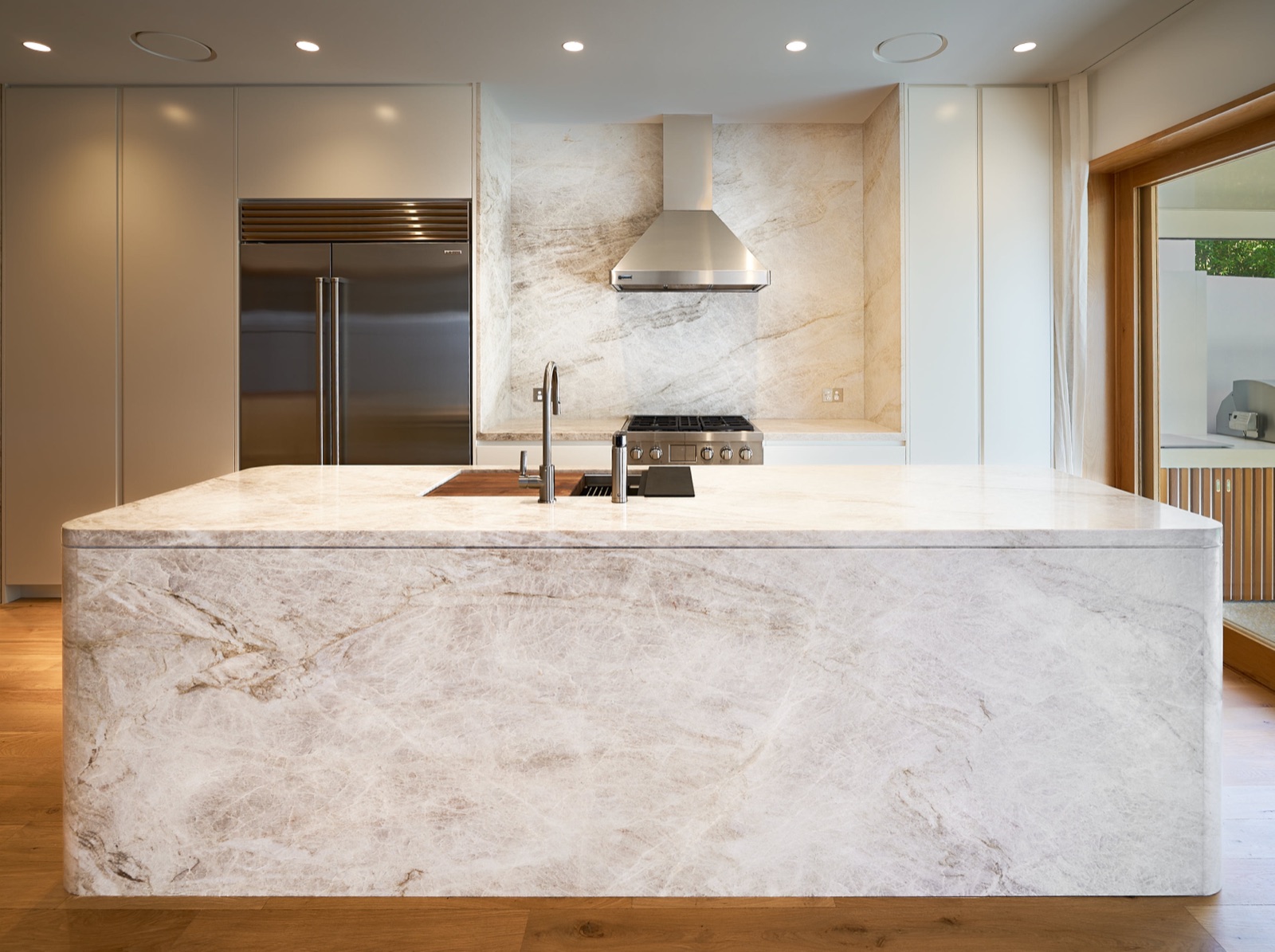 Quartzite island kitchen by Perelli Group